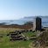 Stone ruins on an island in a fjord